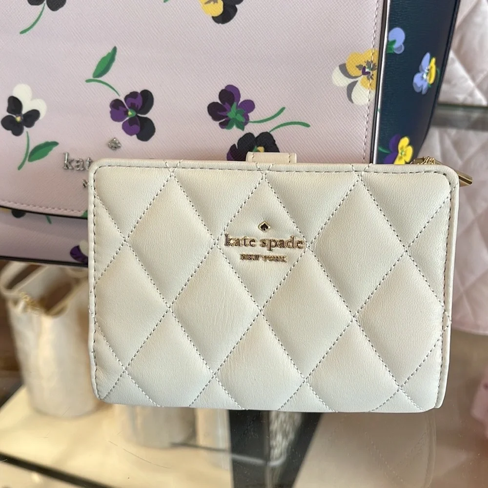 Kate Spade Carey Medium Compartment Bifold Wallet
COLOR: Parchment - Picture 8 of 16
